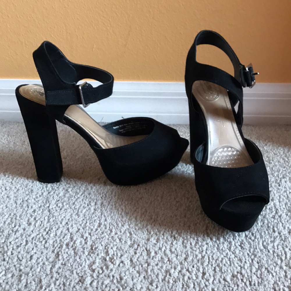 Black suede pumps